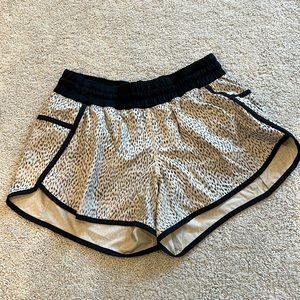 Lululemon pink and black running shorts. Size 10. Great condition.